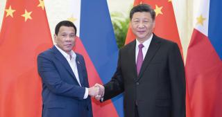 Chinese President Xi Jinping (right) meets with his Philippine counterpart Rodrigo Duterte in Beijing in April 2019. President Duterte placed the Philippines-U.S. alliance on the backburner in exchange for China’s promised—but never delivered—economic investment.