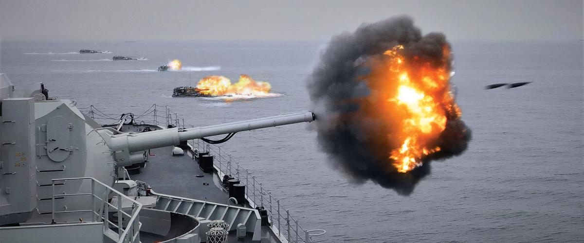 A Chinese destroyer and amphibious assault vehicles fire on Taiwan in the opening assault of the War of 2026. 