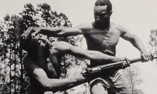 In an undated photo from the 1940s, Corporal Alvin “Tony” Ghazlo, senior bayonet and unarmed combat instructor at Montford Point, North Carolina, disarms his assistant, Private Ernest “Judo” Jones.