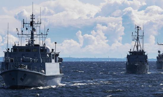 NATO and Swedish ships, led by the Estonian Navy mine-hunter Sakala, steam in formation after departing Tallinn, Estonia, to participate in Baltic Operations 2023. NATO must acknowledge the importance of naval mine warfare in the Baltic and institute a regional plan that focuses on it and coastal defense.