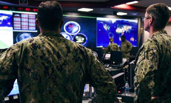 Sailors stand watch at the headquarters of U.S. Fleet Cyber Command